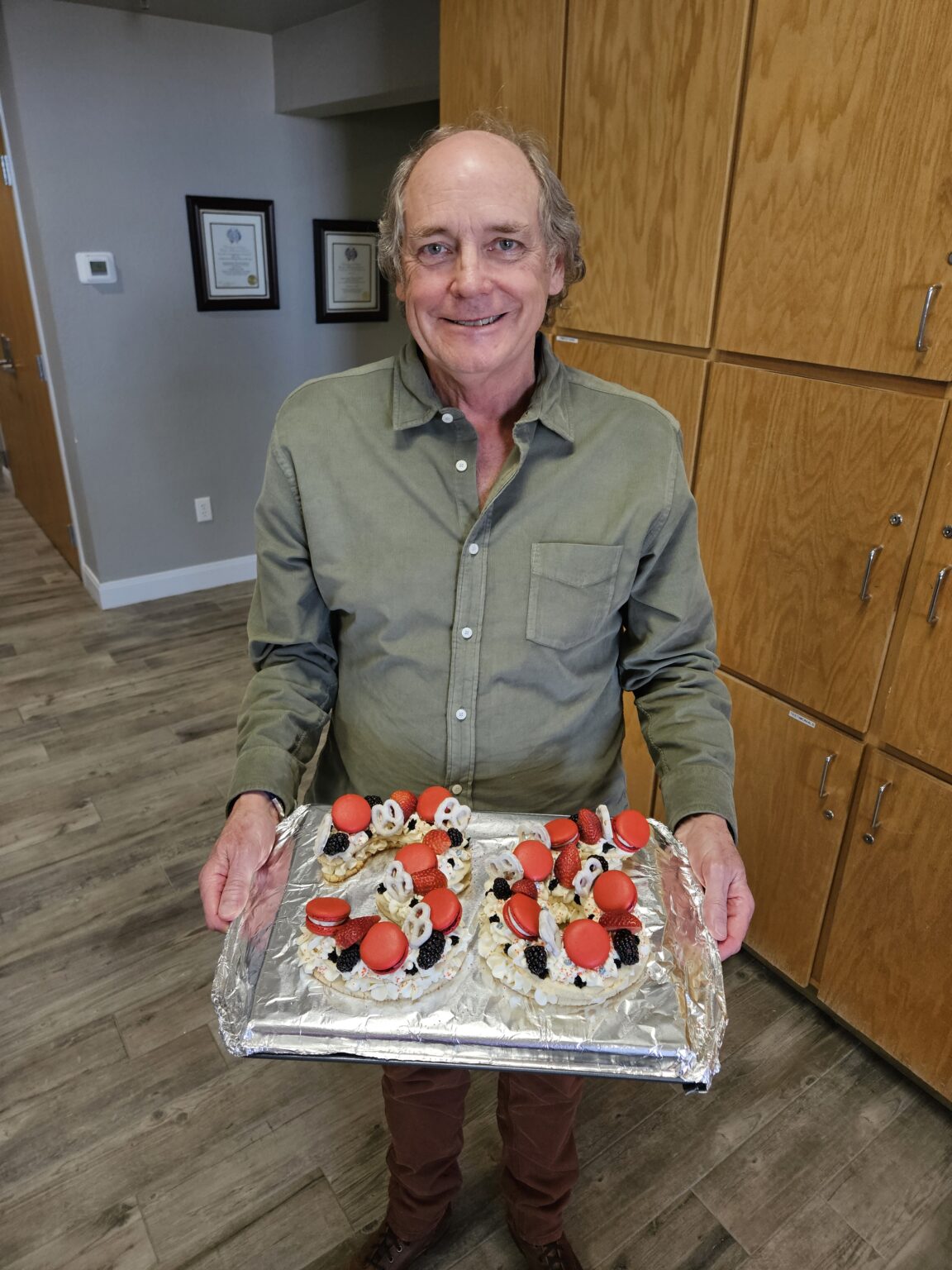 Mark holding 36th anniversary cake