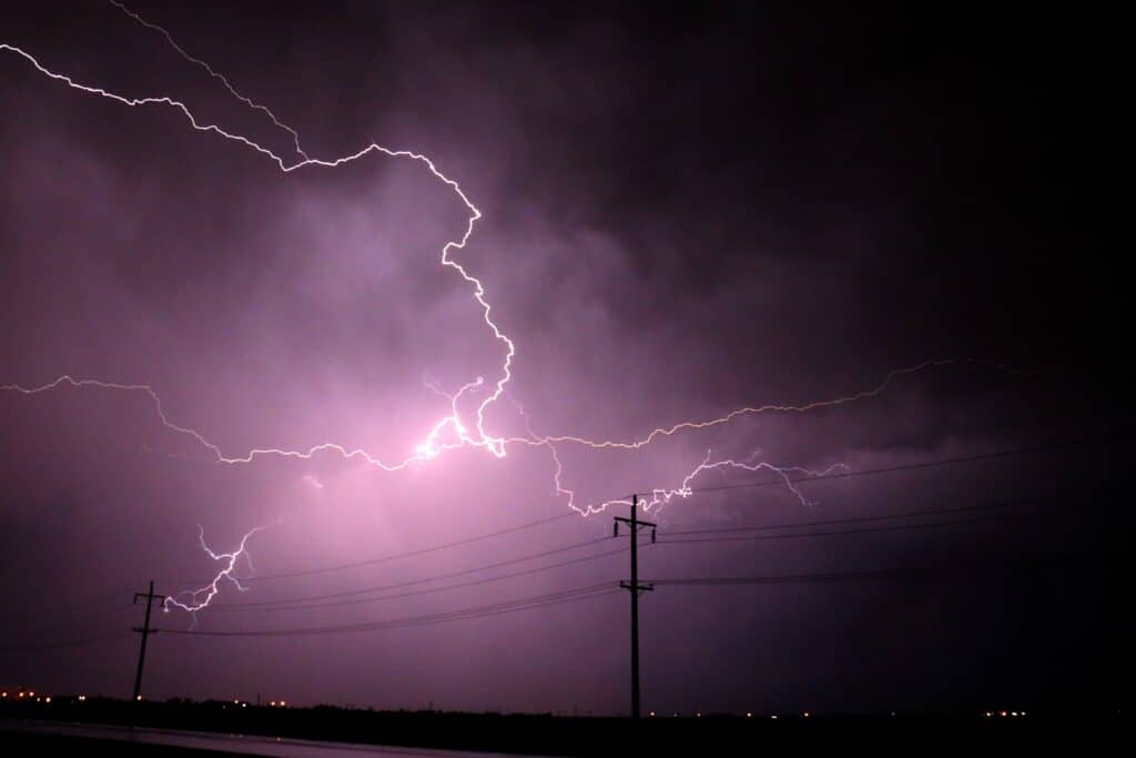 Lightning over power poles